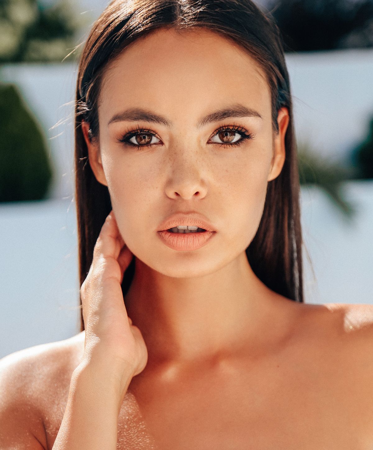 Close-up of a woman with long hair.
