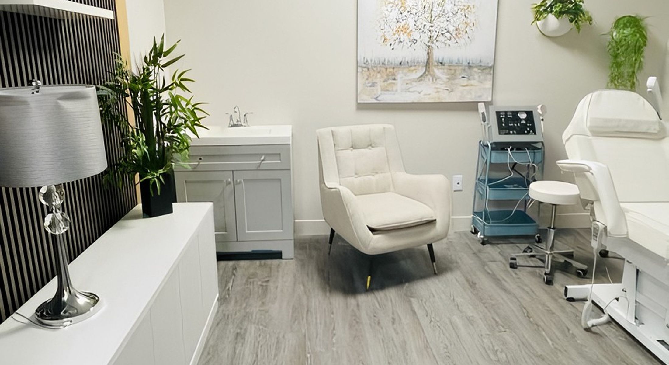 Modern treatment room with cozy seating area.